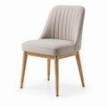 Silla de tela gris con estructura de madera y patas de metal dorado